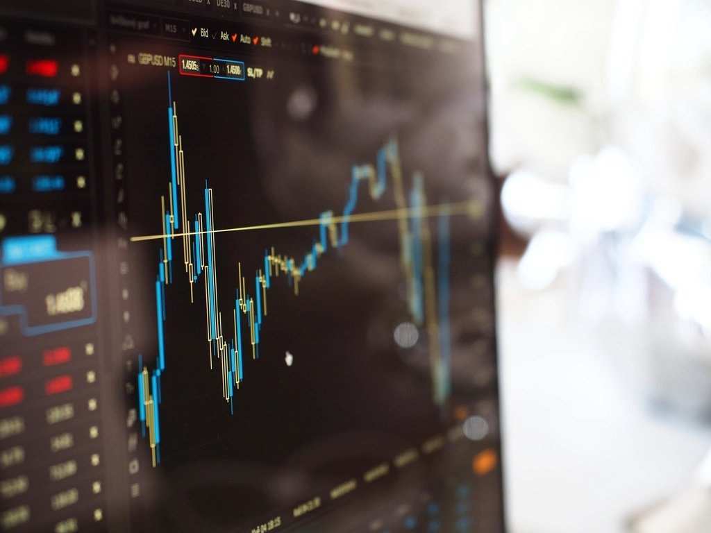 A screen showing a line chart of market prices with figures down the side